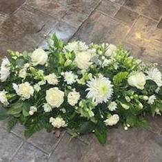 White and green casket spray
