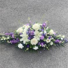 Lilac and white casket spray 