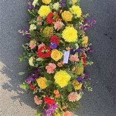 Vibrant casket top