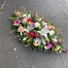 Mixed flower casket spray 